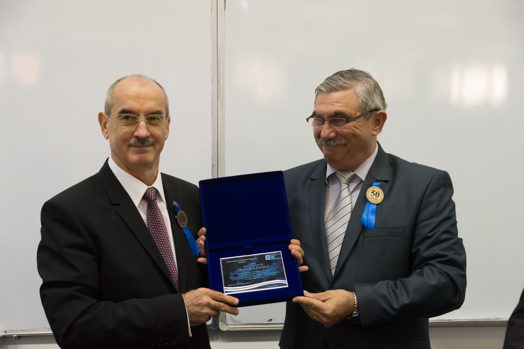 Professor Emeritus Vladimir Creţu and professor Viorel-Aurel Şerban, Rector of UPT